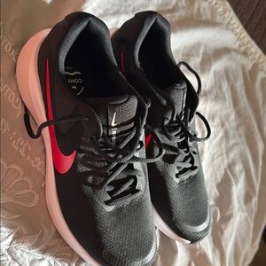 Nike Black and Red Athletic Shoes with Modern Design